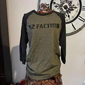 Green Long Sleeve Tee with Bold Graphic Design